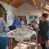 A macrame craft class in full swing. A macrame class in action