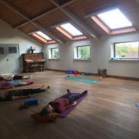 As well as physical activities such as yoga, Pilates and keep fit. Participants in a yoga class.