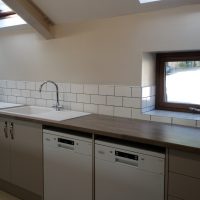 There are two dishwashers, two sinks, two cookers, a fridge-freezer and plenty of counter-top space. Units, sinks and dishwashers in the kitchen